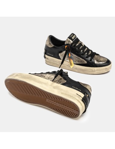 Crime London Skate Wedge She’s Golden – Baskets basses cuir doré et noir effet vintage