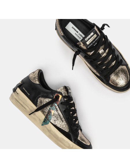 Crime London Skate Wedge She’s Golden – Baskets basses cuir doré et noir effet vintage
