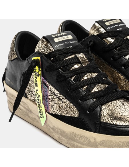 Crime London Skate Wedge She’s Golden – Baskets basses cuir doré et noir effet vintage